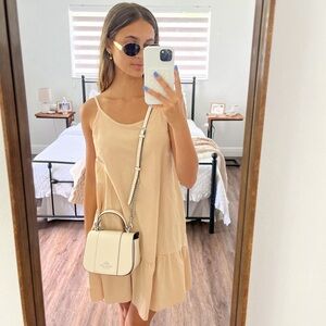 Never worn! Very cute for summer, but just not my style anymore.